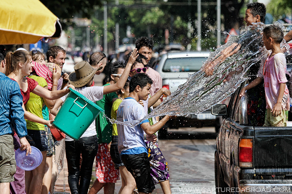 Pi Mai Celebrations in Vientiane, Laos, water stuck in time